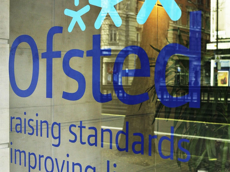 Window of building with Ofsted logo on