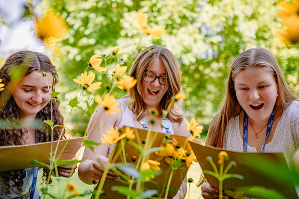 Students surprised when opening envelopes