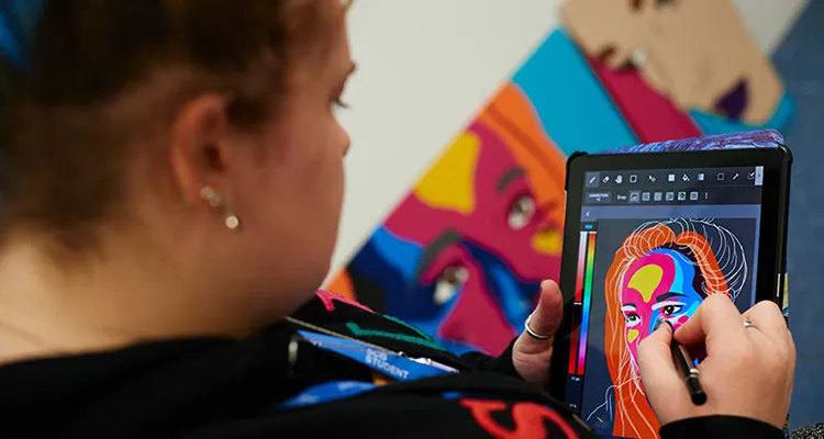 Student uses tablet to create digital image